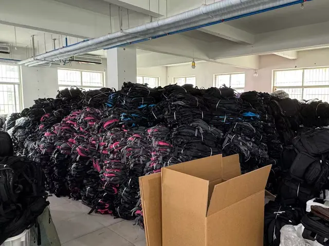 Finished backpacks lined up awaiting final inspection