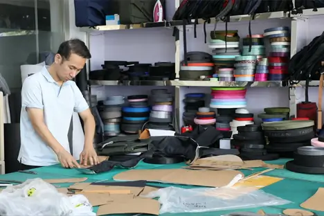 Pattern maker preparing a sample in the Senszx sample room