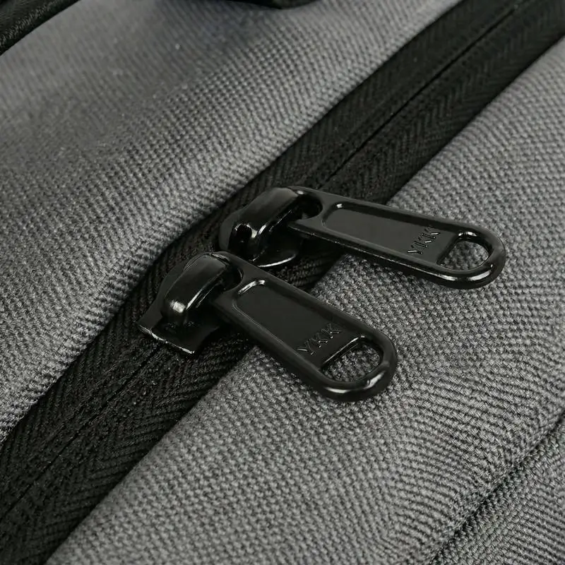 Hidden anti-theft zipper pulls