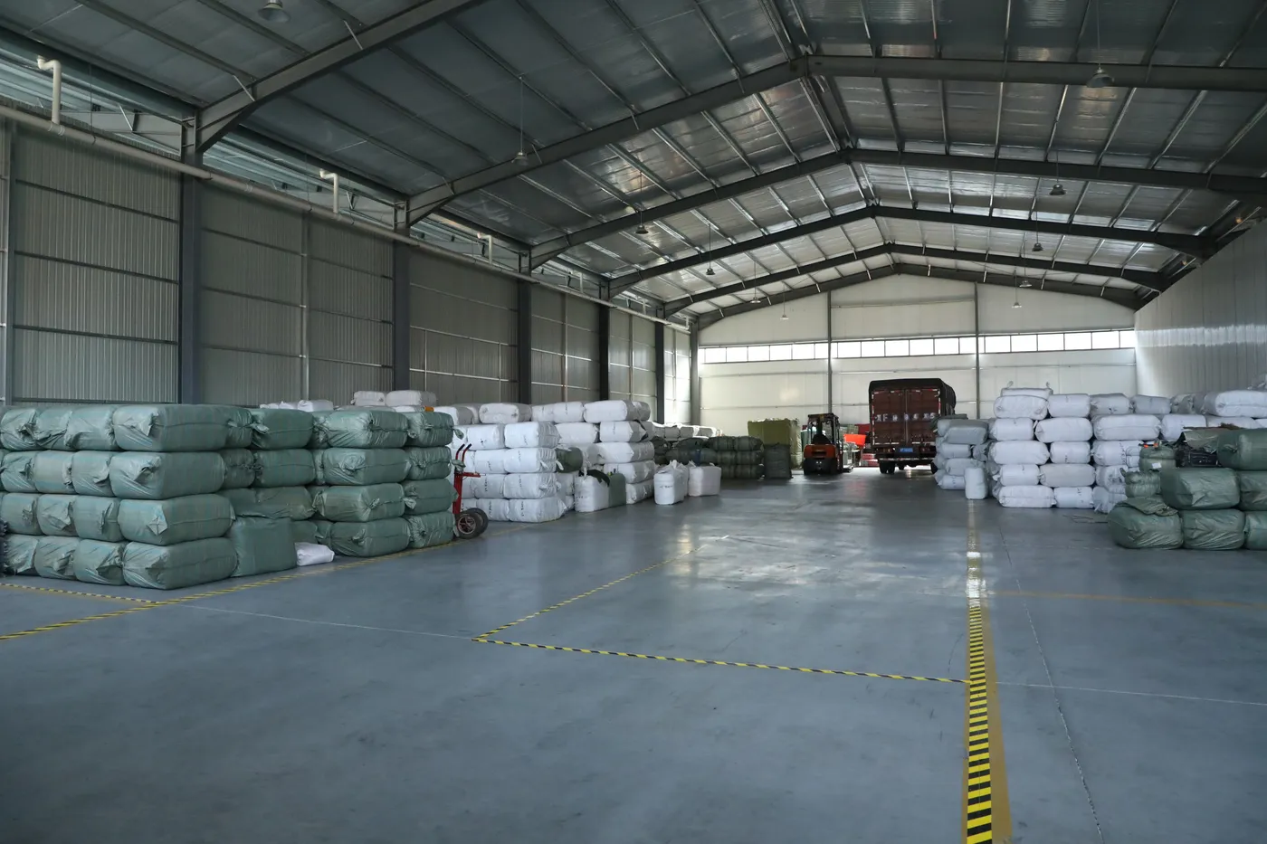 Wide view of the Senszx stock warehouse in Baigou